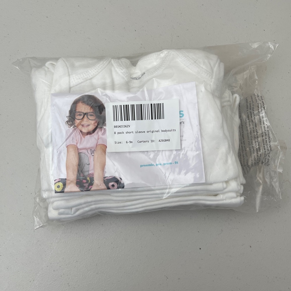 Carter’s 8 pack white short sleeve bodysuit 6-9 & 12 months NWT never opened